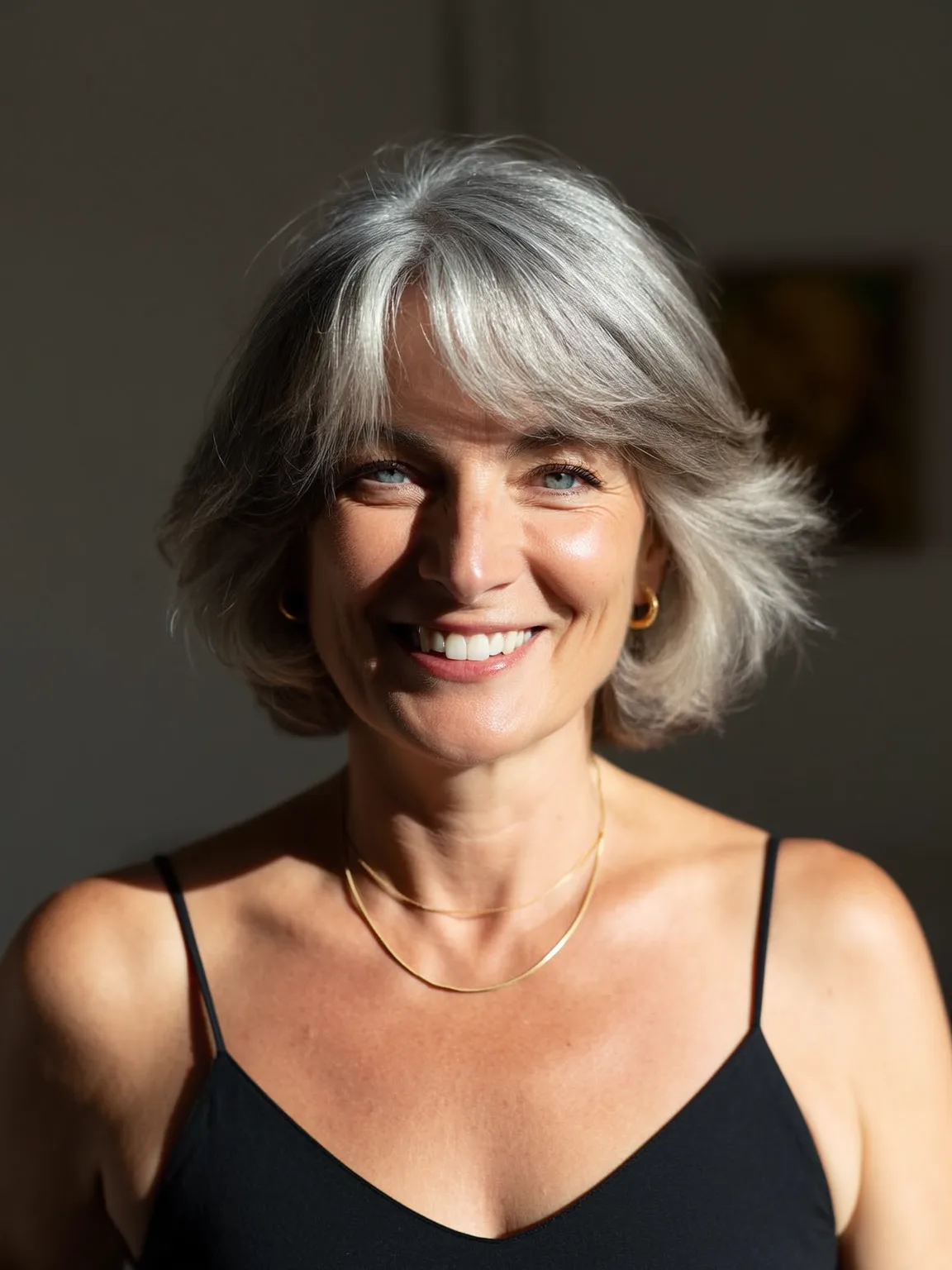 Wavy Layered Silver Frost Bob with Side-Swept Bangs